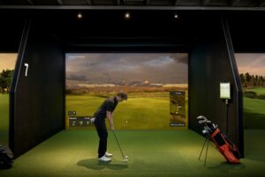 playing golf at simulator